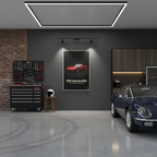 Modern garage with a car, tool cabinet, and framed poster of a red car.